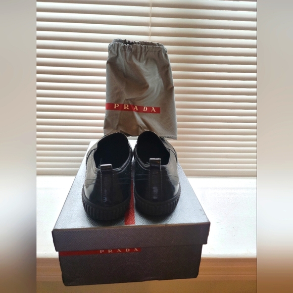 Gently loved Prada slip ons. Comes with dust bag and box. - Picture 4 of 4